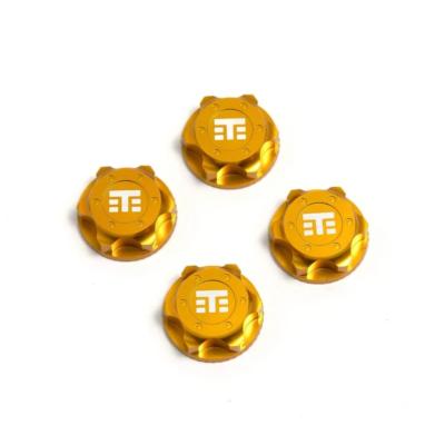 UK-Wheel Nuts (T Logo, 17mm, serrated, YELLOW ano, M12x1.0, 4pcs) TEKNO-RC